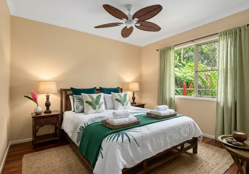 Bedroom staged in Tropical style